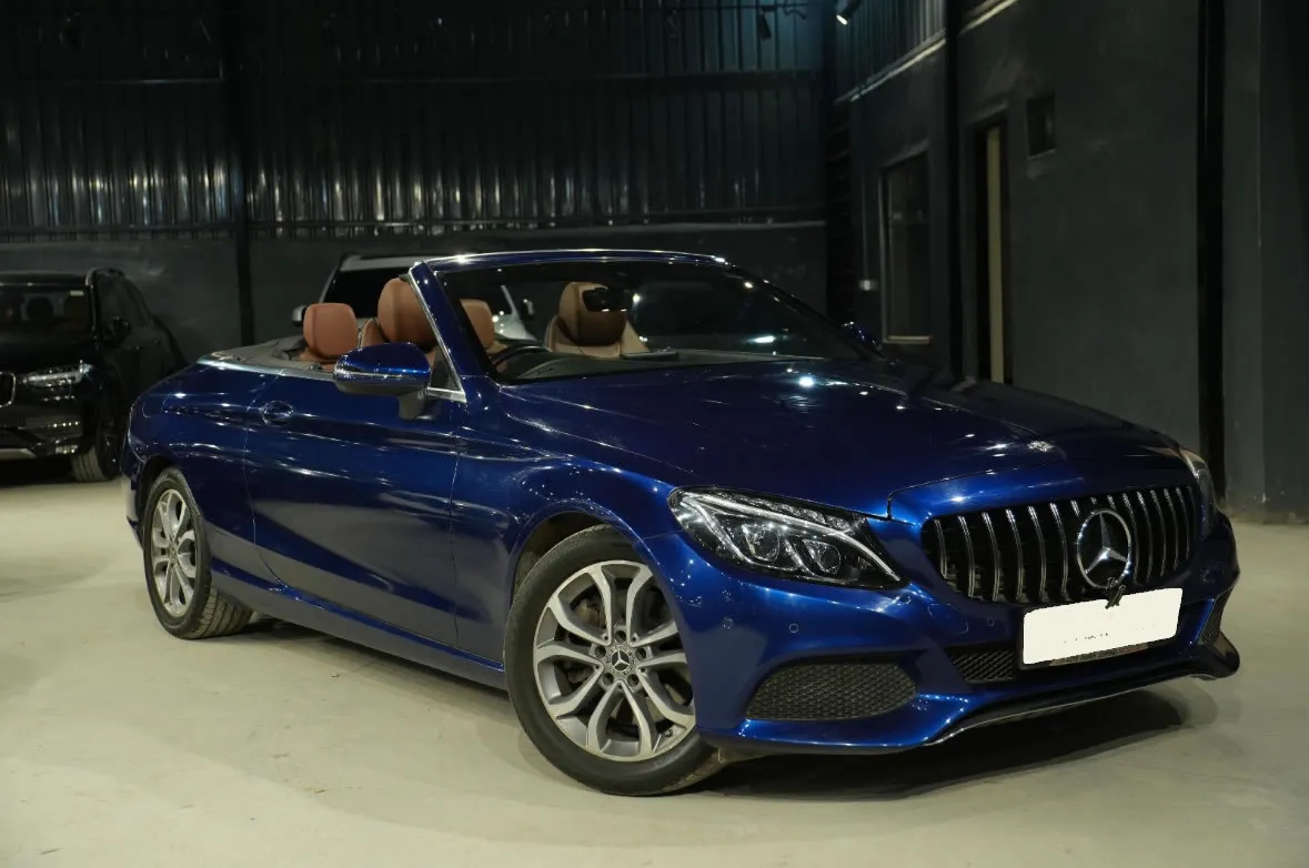 Side profile of the Mercedes Benz C-Class Cabriolet, a premium convertible for rent in Goa.